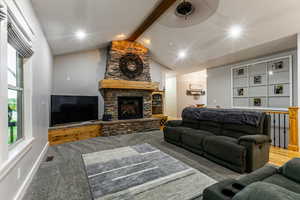 Living area featuring a fireplace and recessed lighting