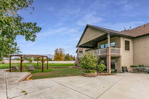 Patio / terrace featuring a patio area and a lawn