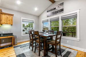 Dining room featuring light wood-style flooring and recessed lighting