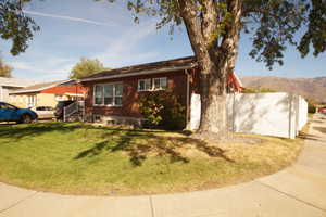 Ranch-style home featuring brick siding and a mountain view