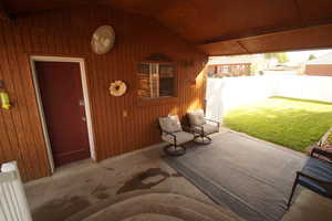 Fenced backyard featuring a patio