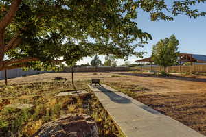 Surrounding community with a patio area