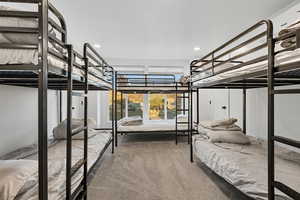 Bedroom with carpet flooring and recessed lighting