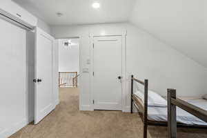 Unfurnished office featuring light colored carpet and a wall mounted AC