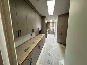 Kitchen with modern cabinets and a skylight