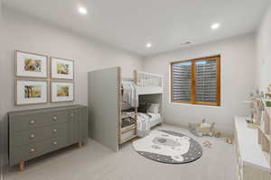 Bedroom with recessed lighting and light colored carpet