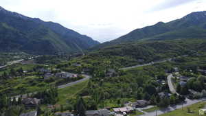 View of mountain backdrop with nearby suburban area