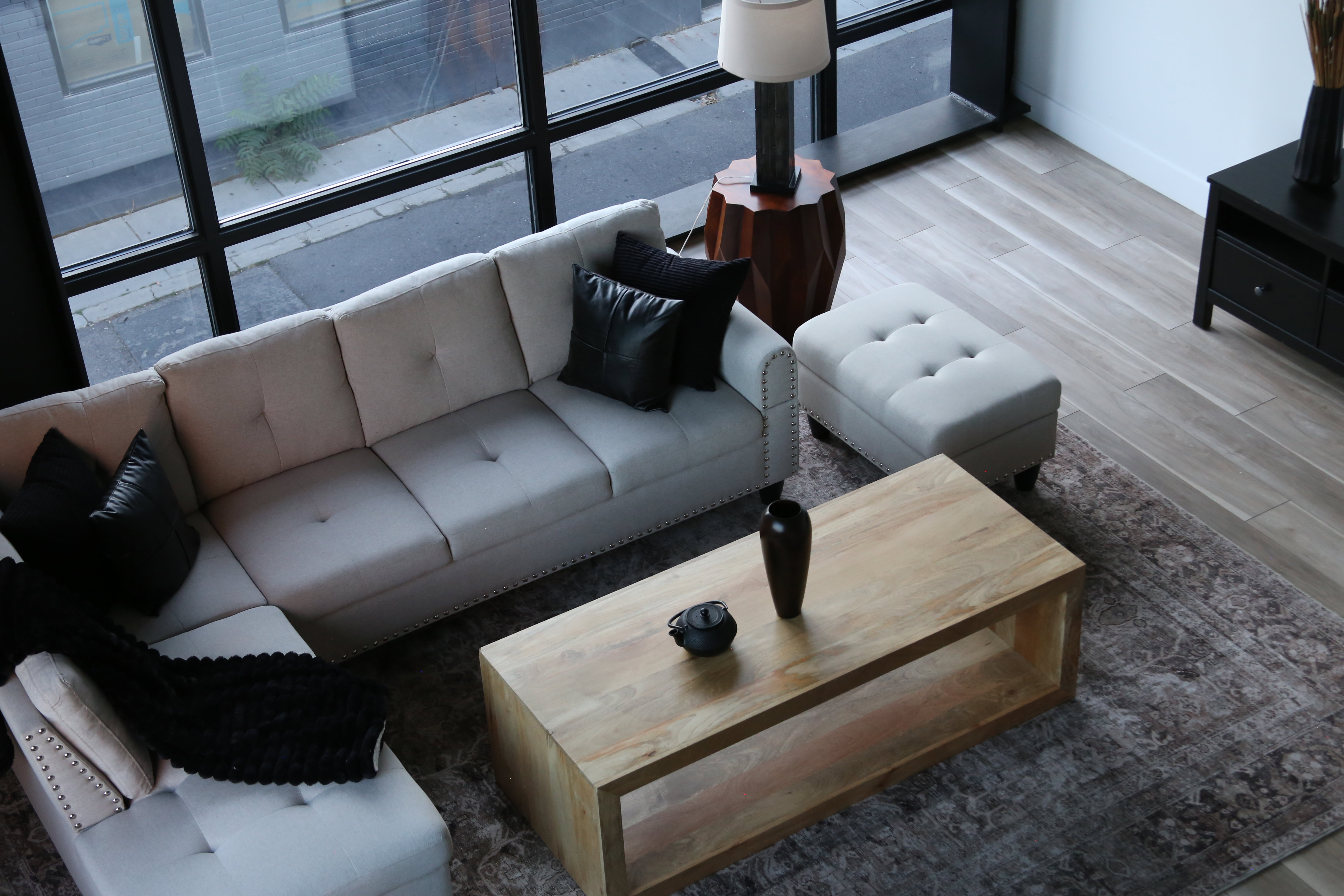 Living area featuring light wood-style flooring and baseboards