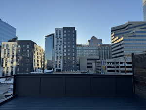 Balcony featuring a view of city