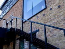 View of side of property with brick siding