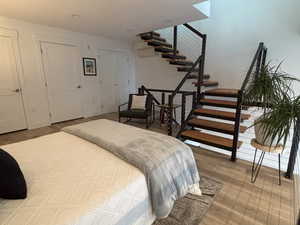 Bedroom featuring closet, and closet with washer and dryer hookups.