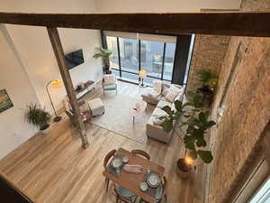 Living room with recessed lighting and wood finished floors
