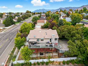 Aerial view of residential area with a mountainous background