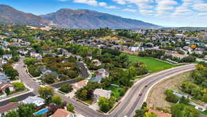 Aerial view of residential area featuring mountains