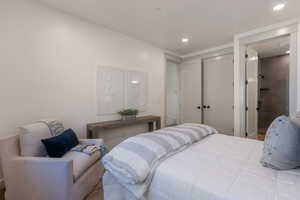 Bedroom featuring recessed lighting and ensuite bathroom