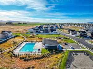 Aerial perspective of suburban area with a mountainous background