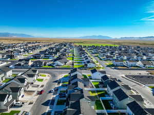 Aerial view of residential area featuring mountains