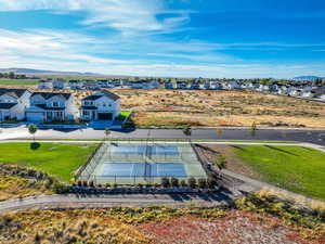 Aerial perspective of suburban area with a mountain backdrop