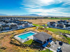 Aerial view of residential area with a mountainous background