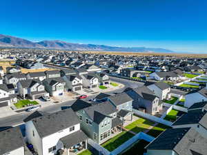Aerial perspective of suburban area with a mountain backdrop
