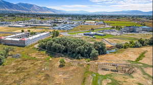 Aerial view of a mountainous background and an industrial area