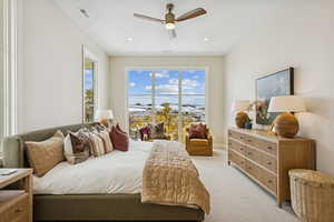 Bedroom with light carpet, access to outside, and ceiling fan