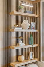 Sauna / steam room featuring wallpapered walls