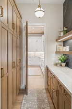 Bathroom featuring vanity and light wood-style floors