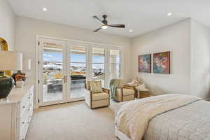 Bedroom with multiple windows, light carpet, access to outside, recessed lighting, and a ceiling fan
