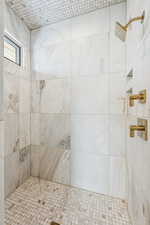 Bathroom with a tile shower