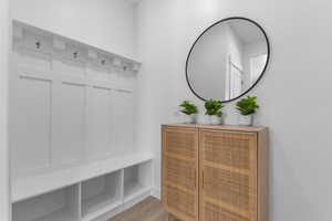 Mudroom with wood finished floors