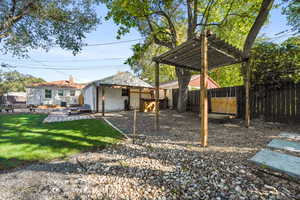 View of yard featuring a patio area and a pergola