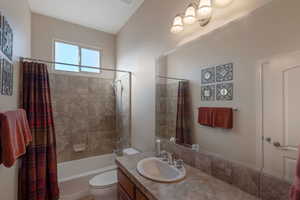 Full bath with shower / tub combo and vanity