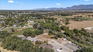 Aerial overview of property's location with a mountainous background