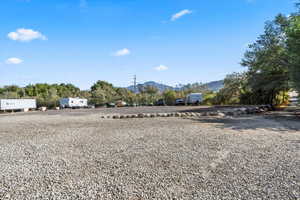 View of yard with a mountain view