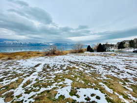 View of yard layered in snow