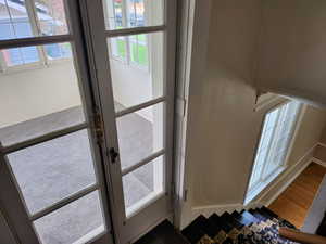 Doorway with wood finished floors