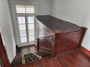 Interior space featuring dark wood-style floors and french doors