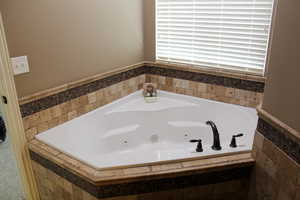 Bathroom featuring a jetted tub