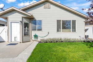 Bungalow-style house with a gate