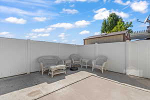 Fenced backyard featuring a patio area