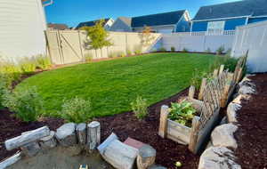 View of yard featuring a garden