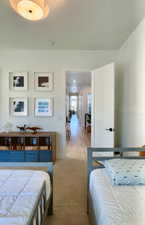 Bedroom featuring light colored carpet