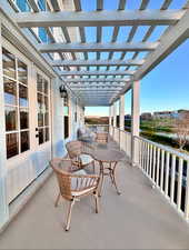 View of patio / terrace featuring a water view and french doors