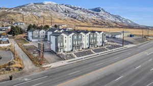 Aerial view of residential area with a mountain backdrop