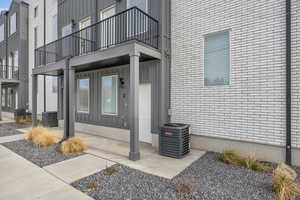 Property entrance with brick siding