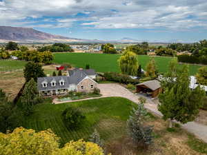 Overview of rural landscape featuring a mountainous background