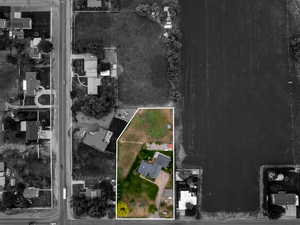 Aerial view of property and surrounding area with property boundaries highlighted