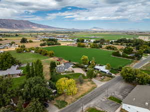 Aerial view of sparsely populated area featuring a mountainous background