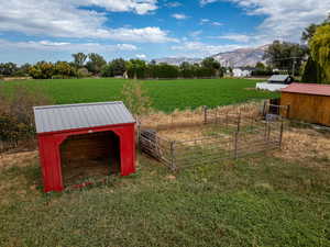 View of yard featuring an outbuilding and a mountain view
